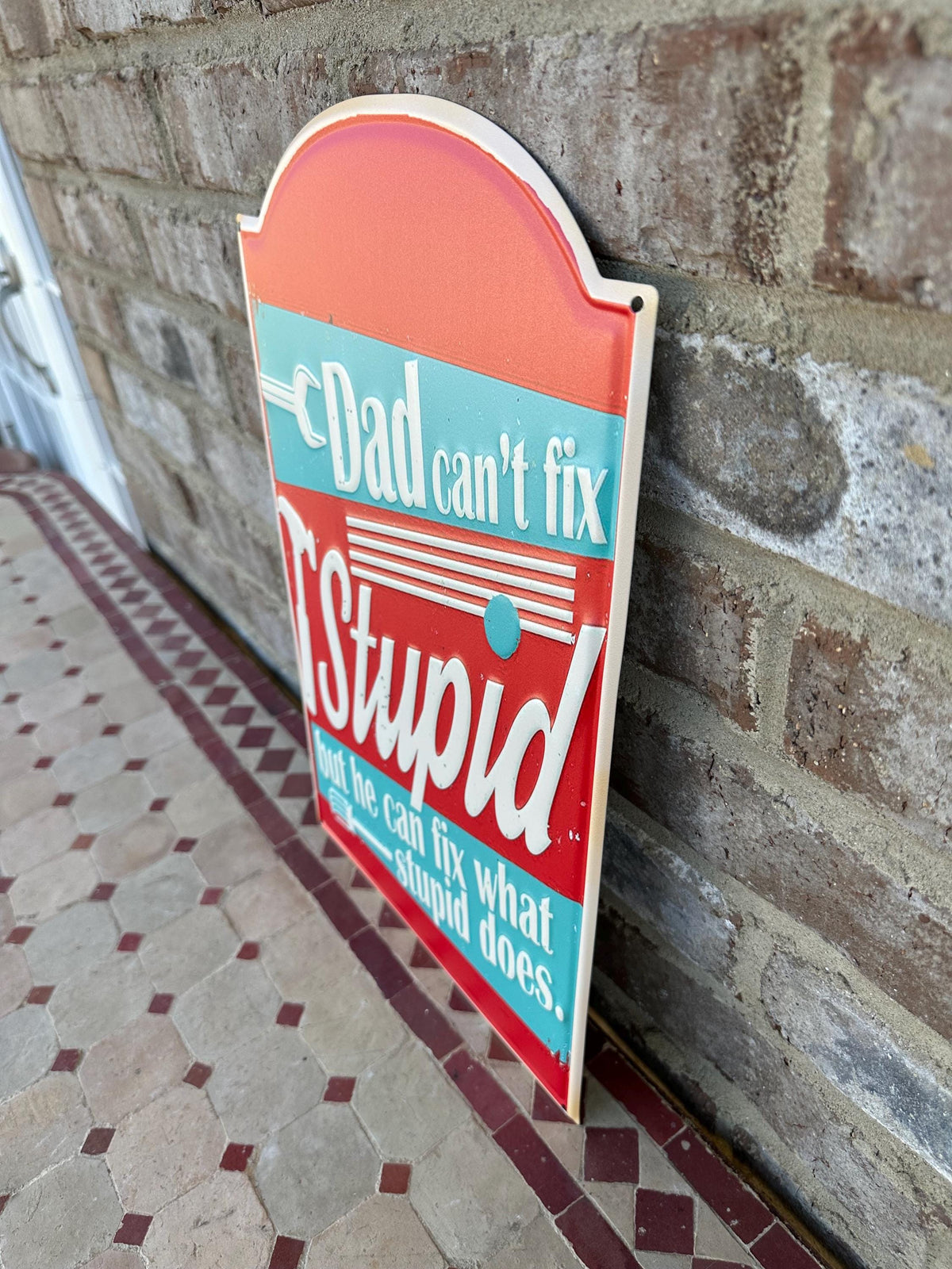 Embossed Metal Shop Sign "Dad Can’t Fix Stupid But He Can Fix What Stupid Does"
